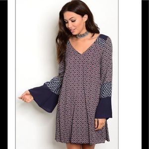 Lined long bell sleeves mixed media dress navy size small nwt boutique